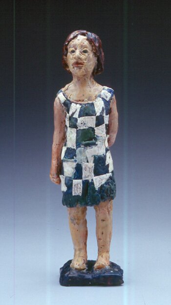 Young Caucasian Woman in Blue/White Checkered Dress