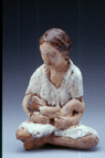 Seated Young Mother With Infant